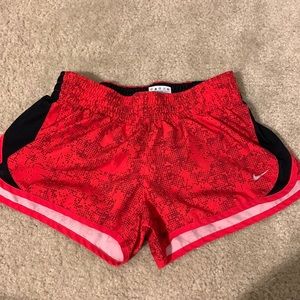 Red and black pattern design Nike shorts size small